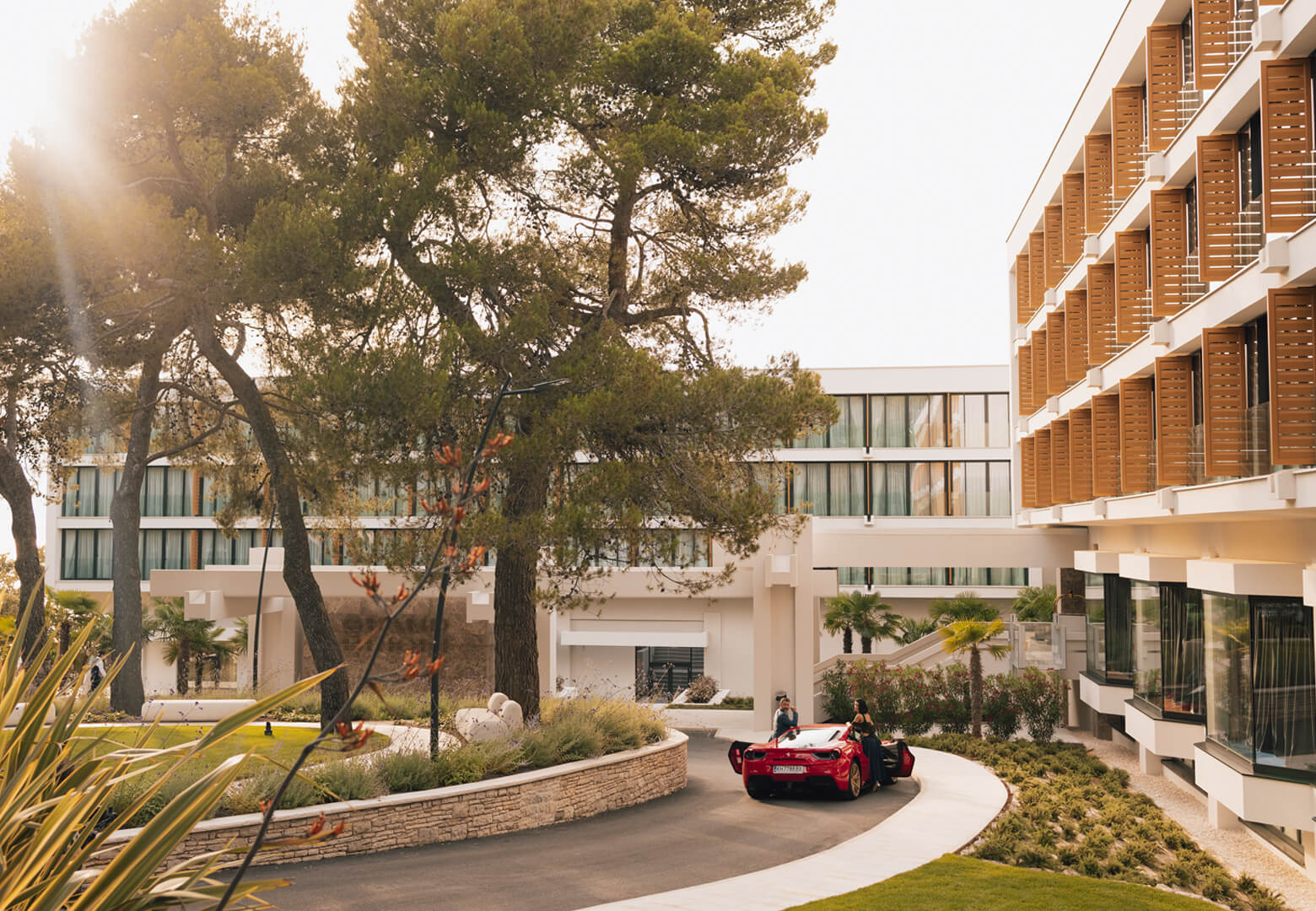 Sports car in front of hotel